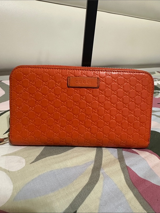 Gucci Handbags - Gucci Orange Quilted Leather Zip Wallet